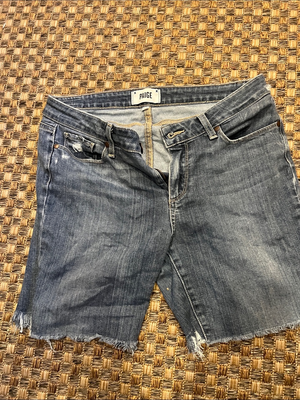 PAIGE Raw Hem Cutoff Denim Shorts in Faded Blue 31